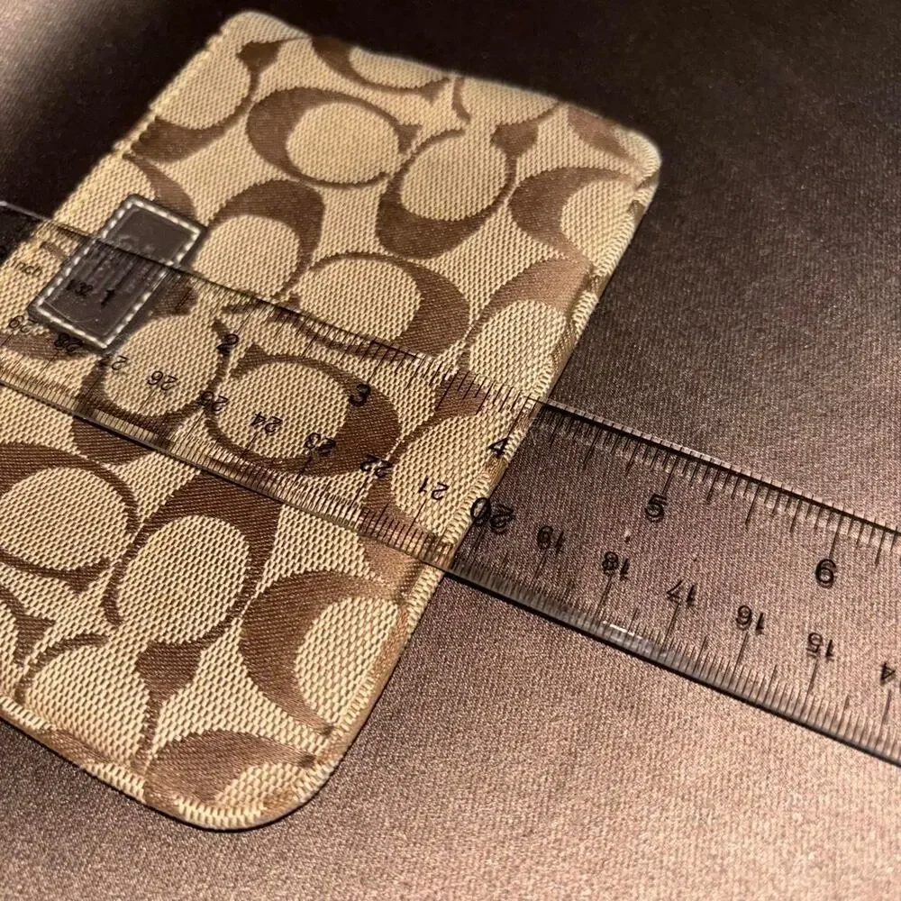 💚 Coach brown and beige signature wristlet, minor wear but no major callouts